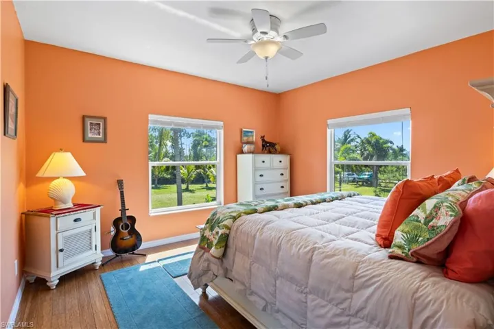 Master bedroom has wood floors, STUNNING views out of both windows and mroe of that natural light that abounds throughout the home!