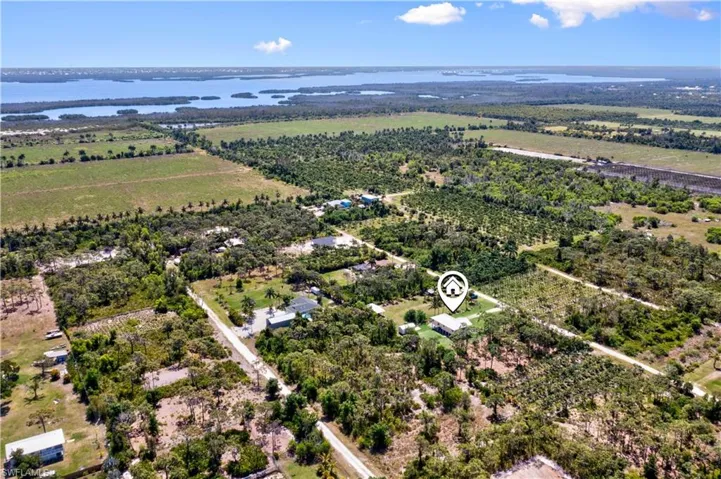 In the rear are photos of the beautiful waters that surround the island - whether you are a die hard or beginner fisherman, paddleboarder, boater or kayaker, there is something for everyone! There is the 160mile Great Blue Calusa waterway for kayakers that is world renowned.  There is Tarpon Lodge for fine dining, the Lazy Flamingo for fresh seafood and ambience, Captain Cons and the Bokeelia pier to watch the perfect sunset!  So much more and endless adventures to enjoy in this slice of paradise!