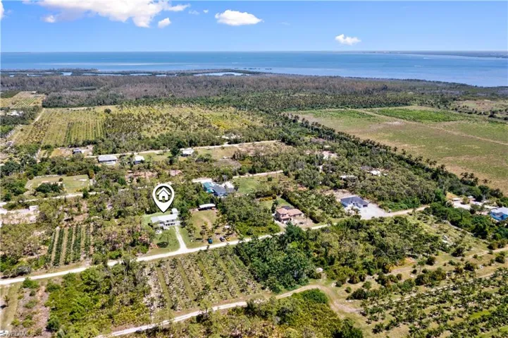 The current property is comprised of three separate parcels that were combined but could be separated again if you wanted to build a family compound. Close to the beautiful Bokeelia encalve and Charlotte Harbor - Bokeelia is located on the largest island in Florida and has generations of fishing and nursery owners as well as an incredibly intersting history!  A beautiful island with wonderful people and a charming lifestyle!  Property is an upside down L shape and the possibilities are endless!