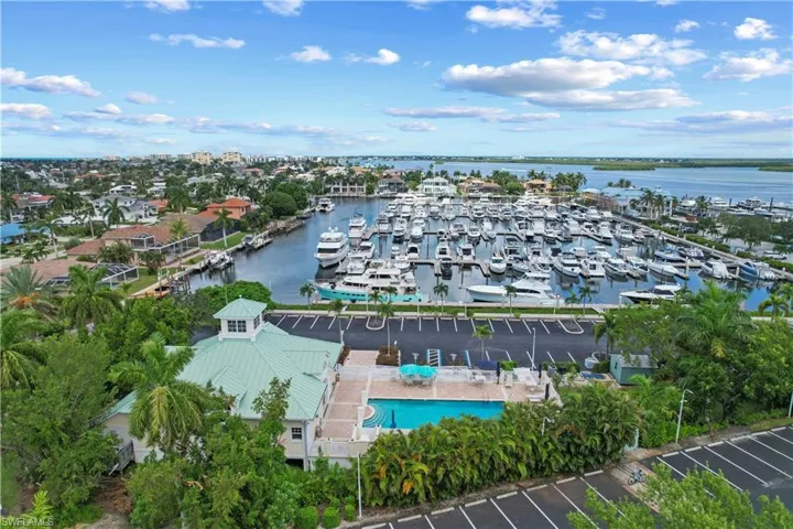 Closest Building and pool. Marco Marina Club house with laundry, showers and ice.