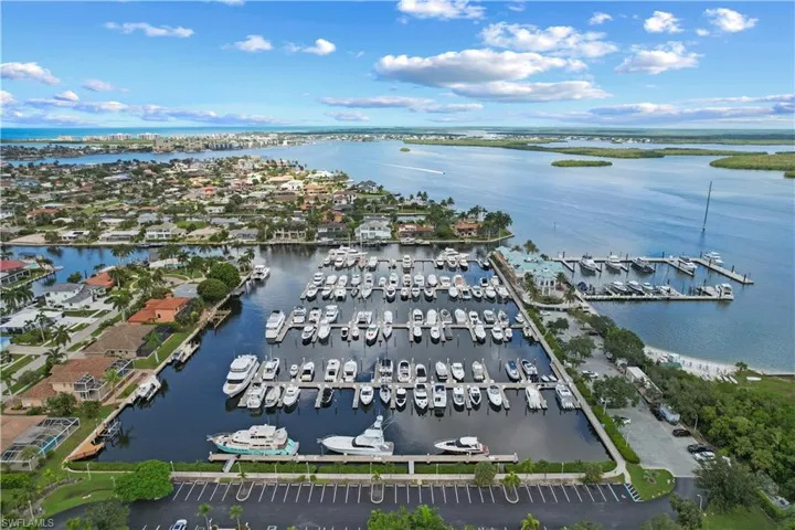 Looking west at the dredged part of the "Hurricane Hole". Yacht club building at far right.