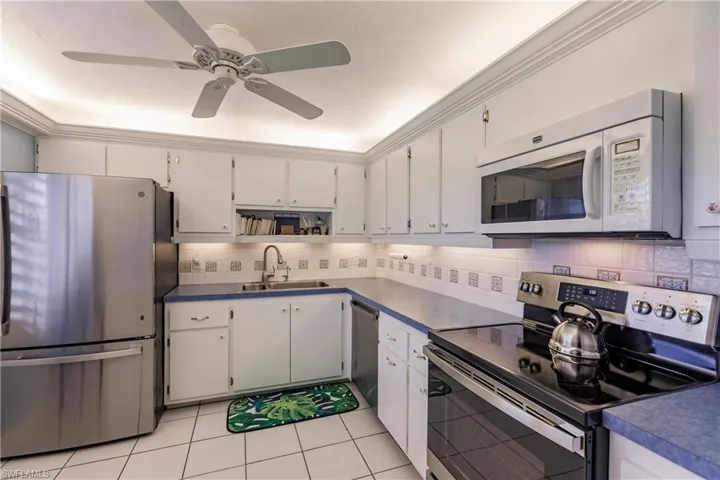 Large Kitchen with plenty of counter and cabinet space.
