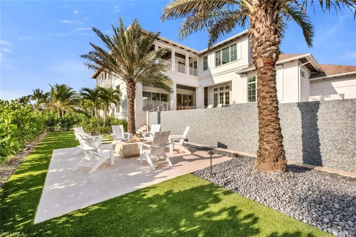 Maintenance-free backyard with firepit