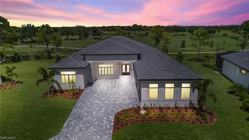 View of front of home featuring a yard