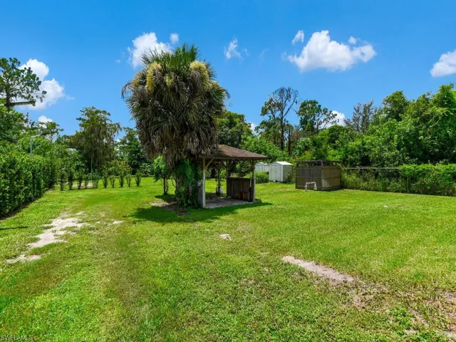 View of yard with a shed