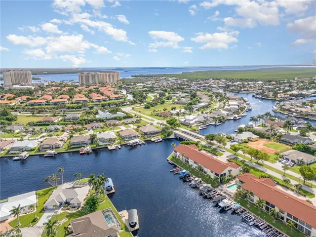 Aerial view of residential area with a large body of water