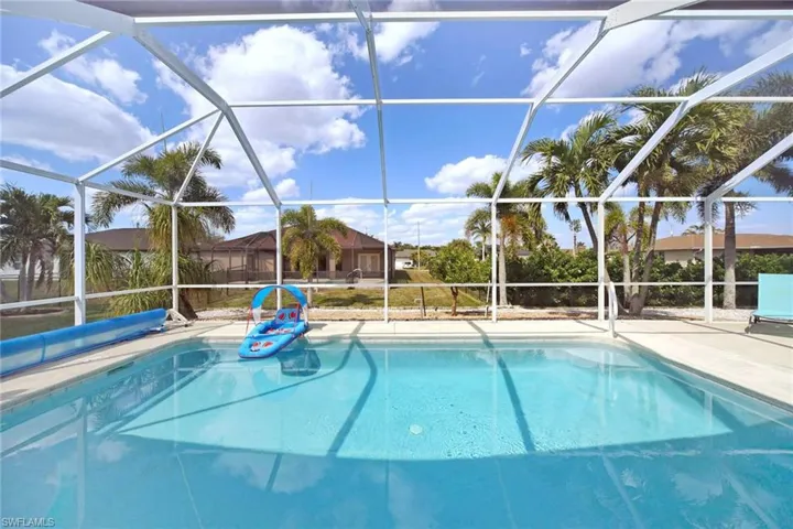 Heated sparkling blue pool with roll out cover