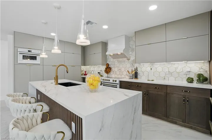 Exotic quartz waterfall countertop