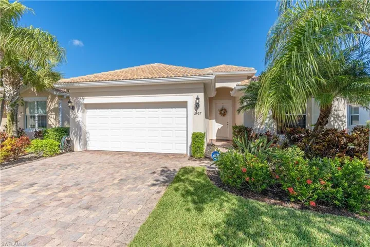 View of front of property with a garage