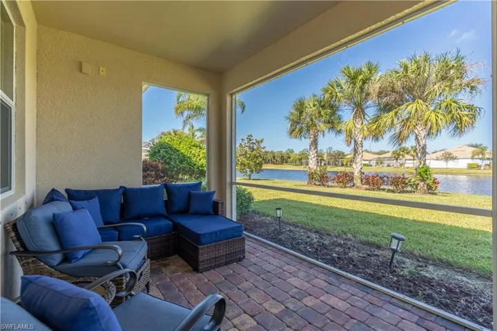 View of patio with a water view