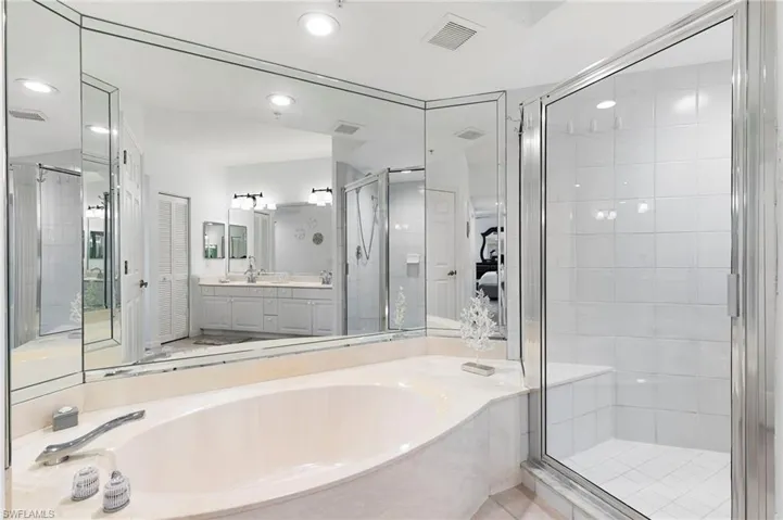 Separate tub and shower and separate water closet