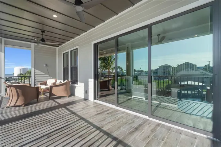 Wooden deck with ceiling fan