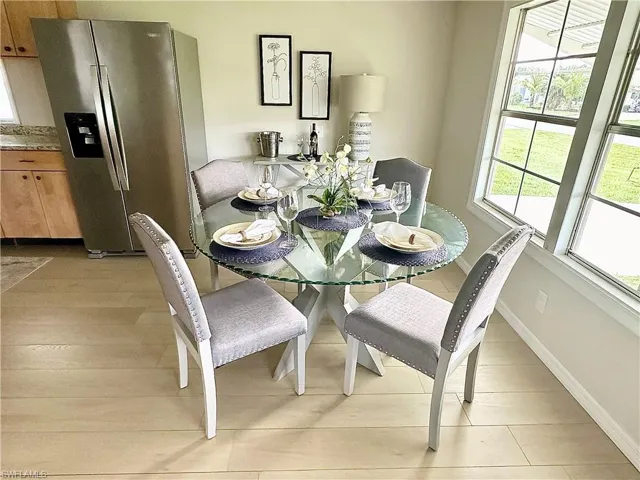 Dining area featuring light wood-type flooring
