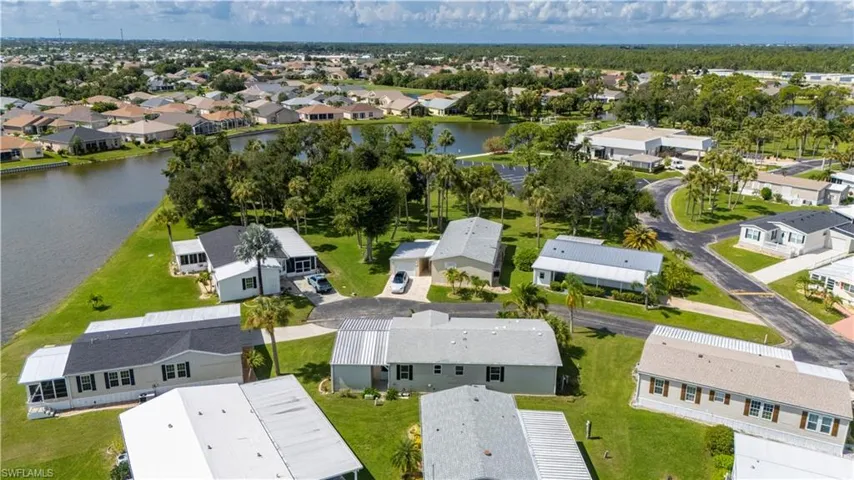 Aerial view of residential area with a large body of water