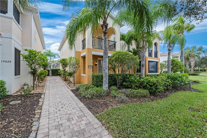 15021 Auk Way Bonita Springs FL 34135 - Front yard and primary entry on side