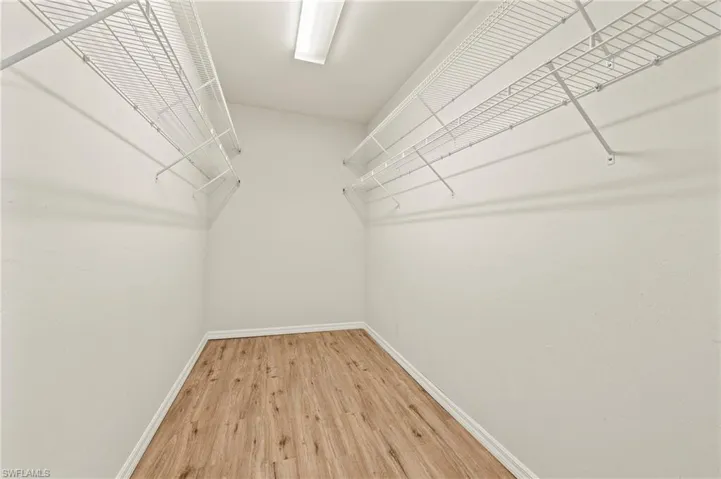 15021 Auk Way Bonita Springs FL 34135 - Very spacious walk in closet in rear bedroom upstairs.
