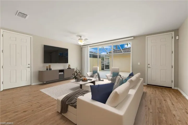 VIRTUALLY STAGED 15021 Auk Way Bonita Springs FL 34135 - Living Room