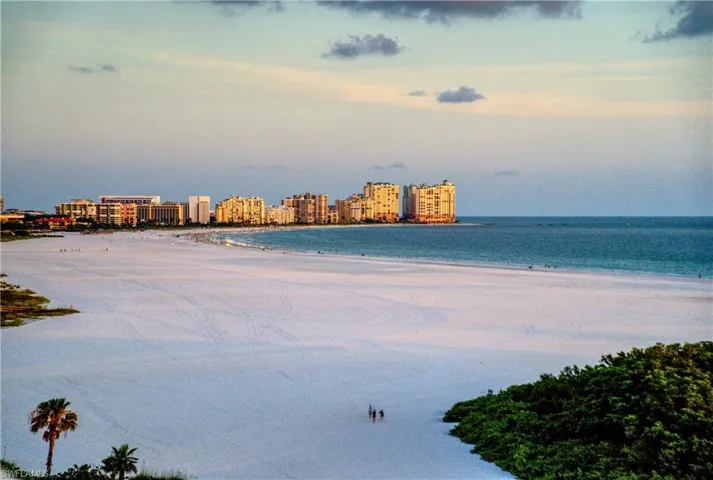 Water view featuring nearby beach and nearby urban area