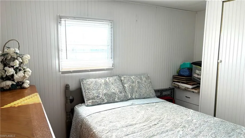 Bedroom has a closet and built-in bureau.