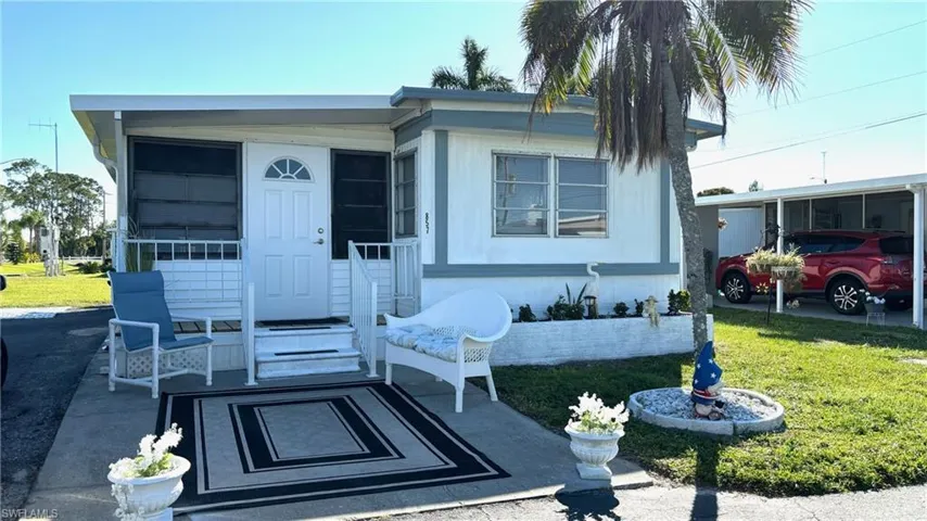 Own your Land AND this cute 1 Bedroom 1 Bathroom home in Lazy Days Village!