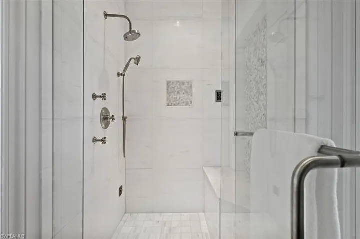 Full bathroom with a stall shower