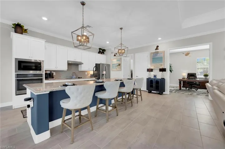 Elegant Chandeliers throughout, all on dimmers