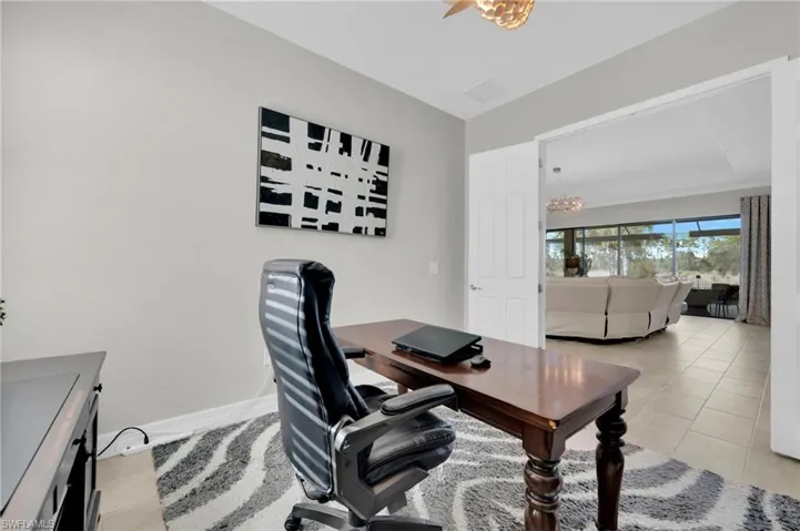 Home office off main living space could also serve as media room or flex space
