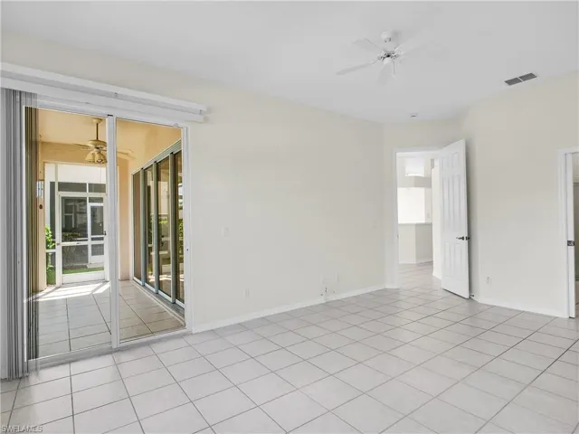 Primary bedroom with entrance to your lanai