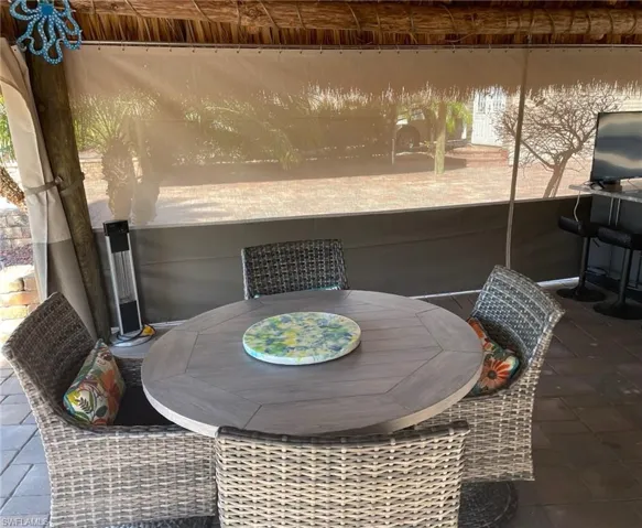 View of patio with outdoor dining space