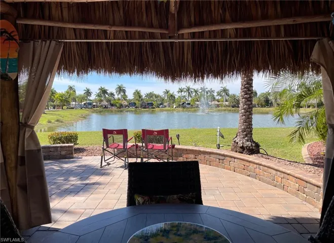 View of patio featuring a water view
