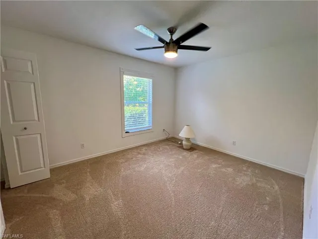 Guest bedroom with ceiling fan