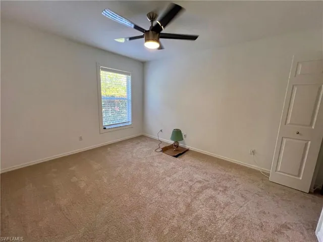 Guest bedroom with ceiling fan