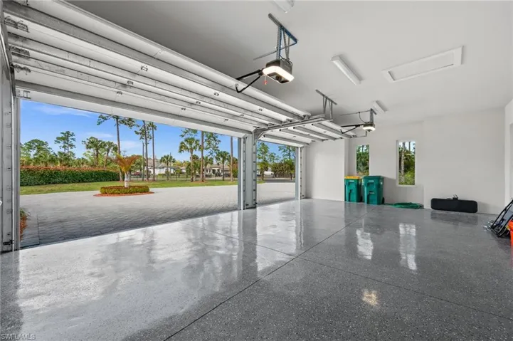 Three car garage with extra space on the sides