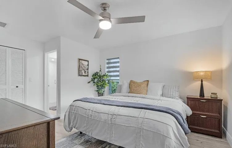 Bedroom featuring light wood-style floors and a ceiling fan
