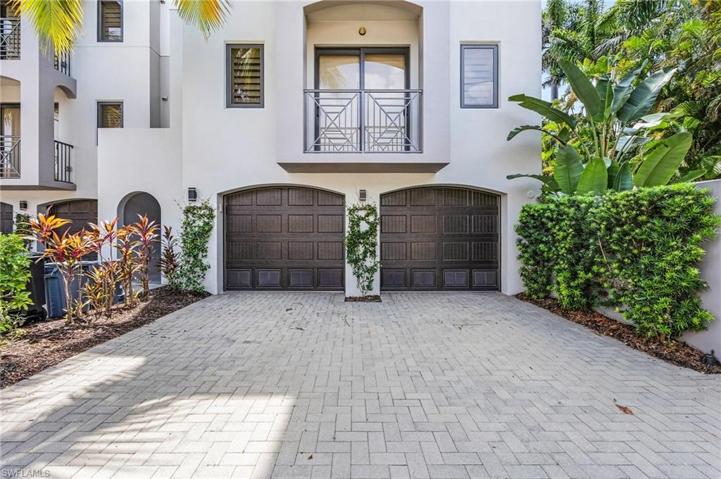 Attached 2 car garage w/ additional parking
