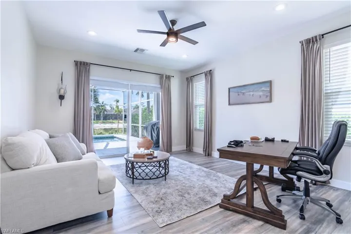 Den/office with recessed lighting, a ceiling fan, and baseboards