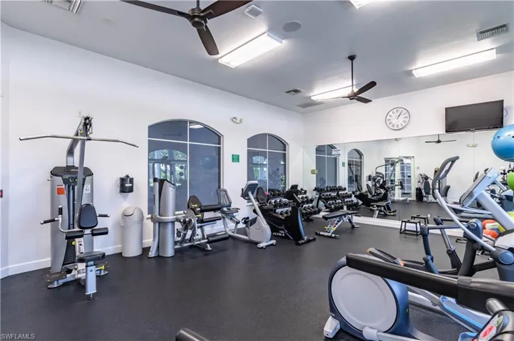 Exercise room with a ceiling fan