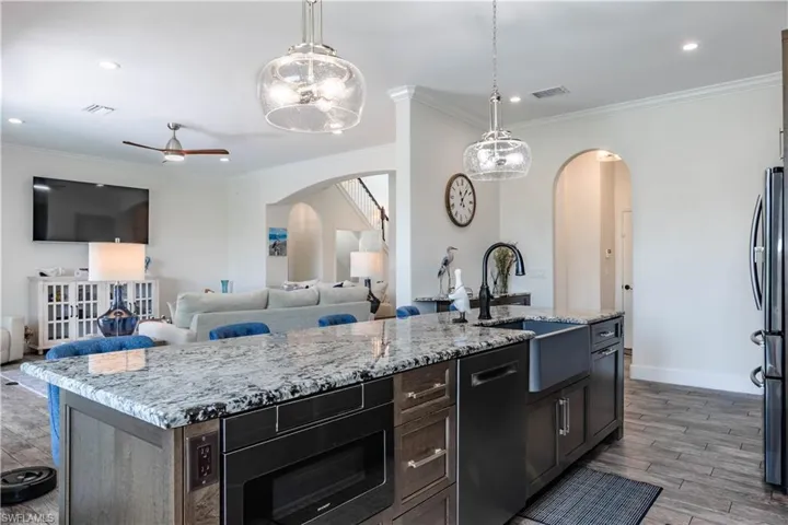 Kitchen with arched walkways