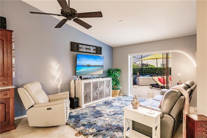 Family Room overlooks pool & kitchen