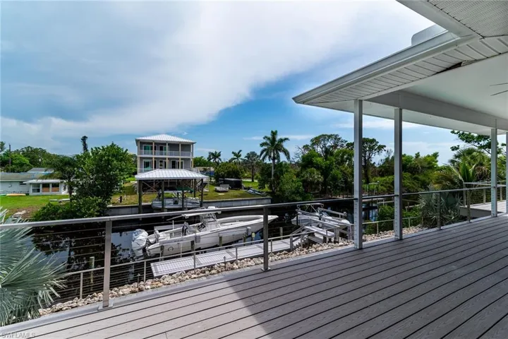 Deck with view of scattered trees