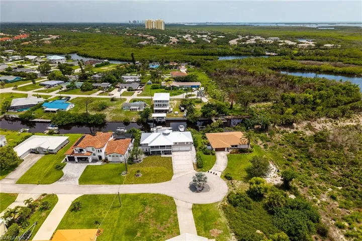 Aerial view of residential area with a nearby body of water