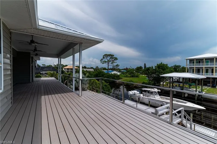 Wooden deck with a ceiling fan