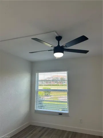 Bedroom with new ceiling fan
