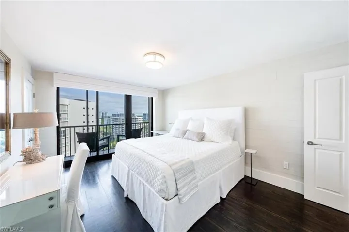 Guest Bedroom enjoys sliding door access to the balcony