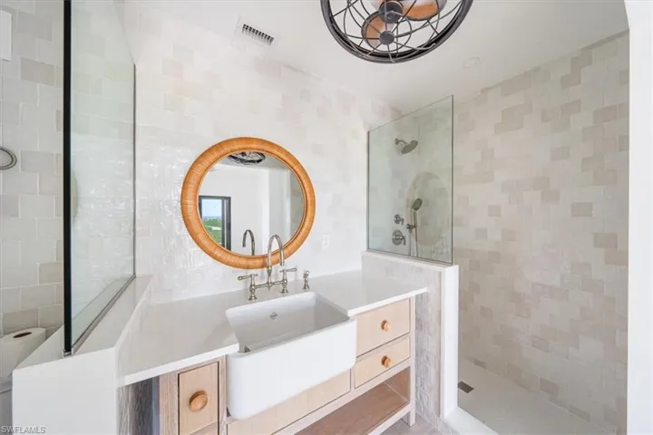 Gorgeous pool side Cabana with a full bathroom is included with this condo.