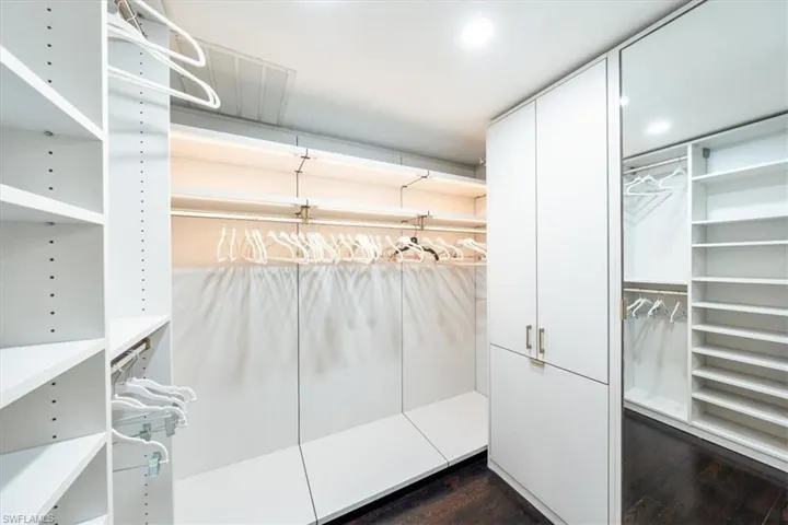 Primary Closet with custom California Closets
