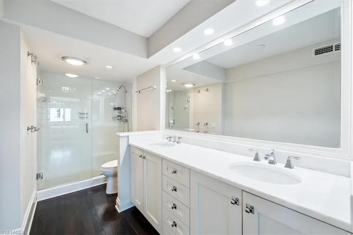 Primary Bathroom has double sinks and walk in shower
