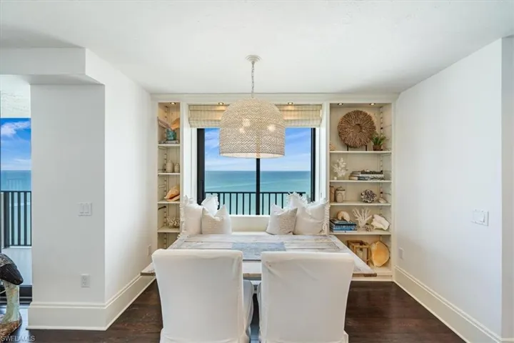 Dining area with built in shelves and a gorgeous view