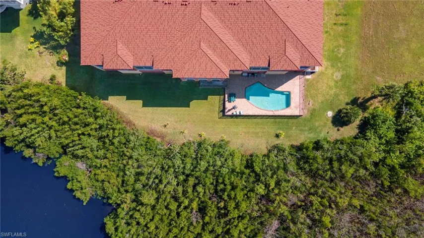 Wooded area around pool near Lake - community has many lakes and launch pads for kayaking - some that will take you to Charlotte Bay