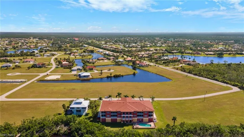 Many lakes in community - Burnt Store Marina Left of roads